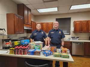 Firefighters with donations
